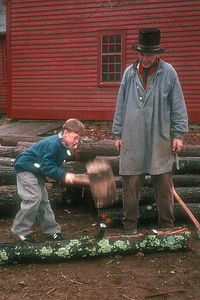 Tommy splitting wood