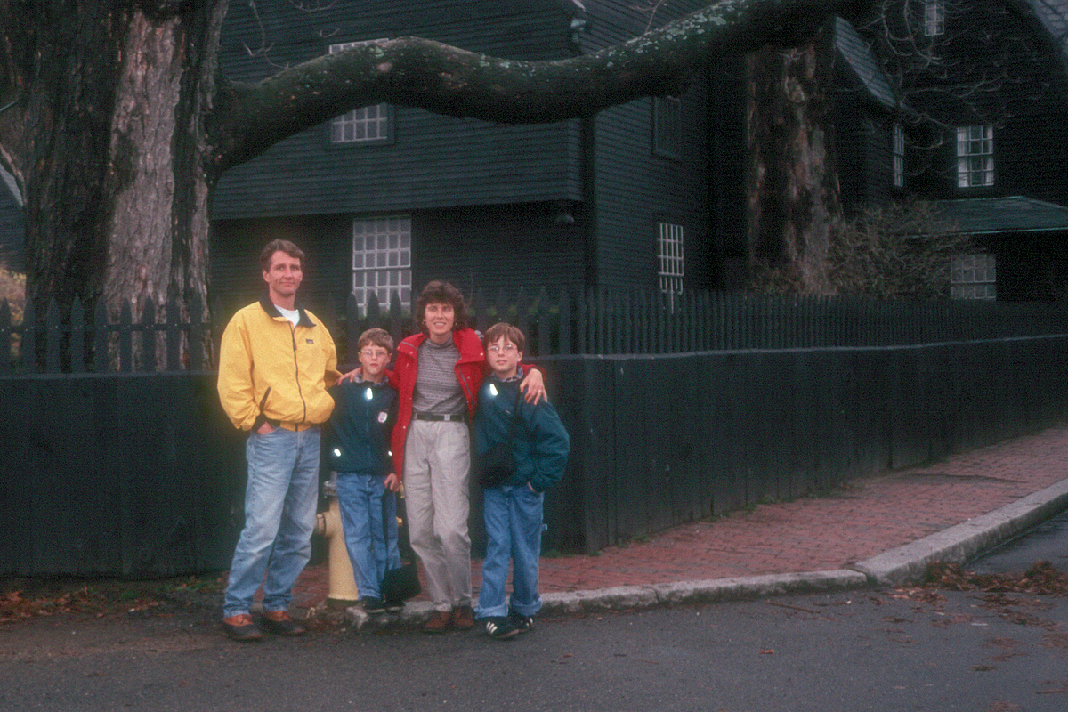 Family in front of House of 7 Gables