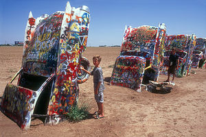 Boy's painting desert cadillacs