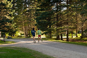 Boys running from Parc du Mont-Sainte-Anne Campground