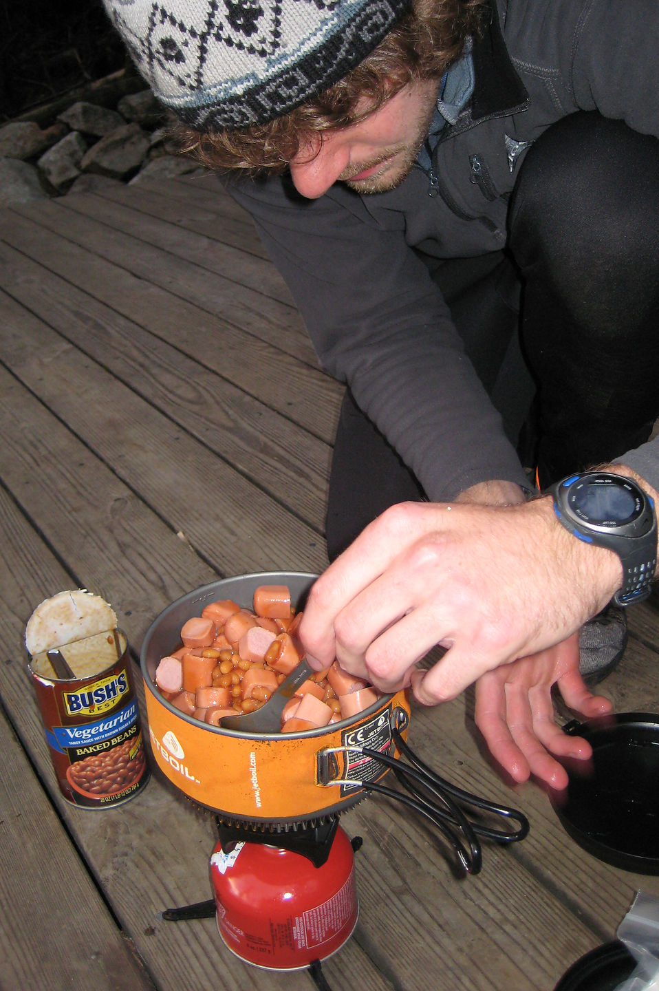 Nik cooking up some beans