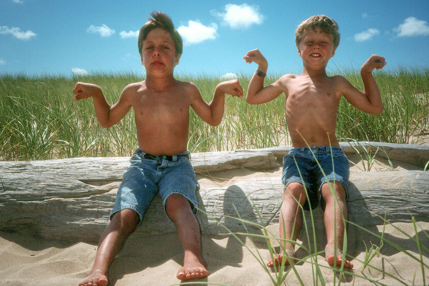 Boys Flexing on "Herb + Lolo" Log