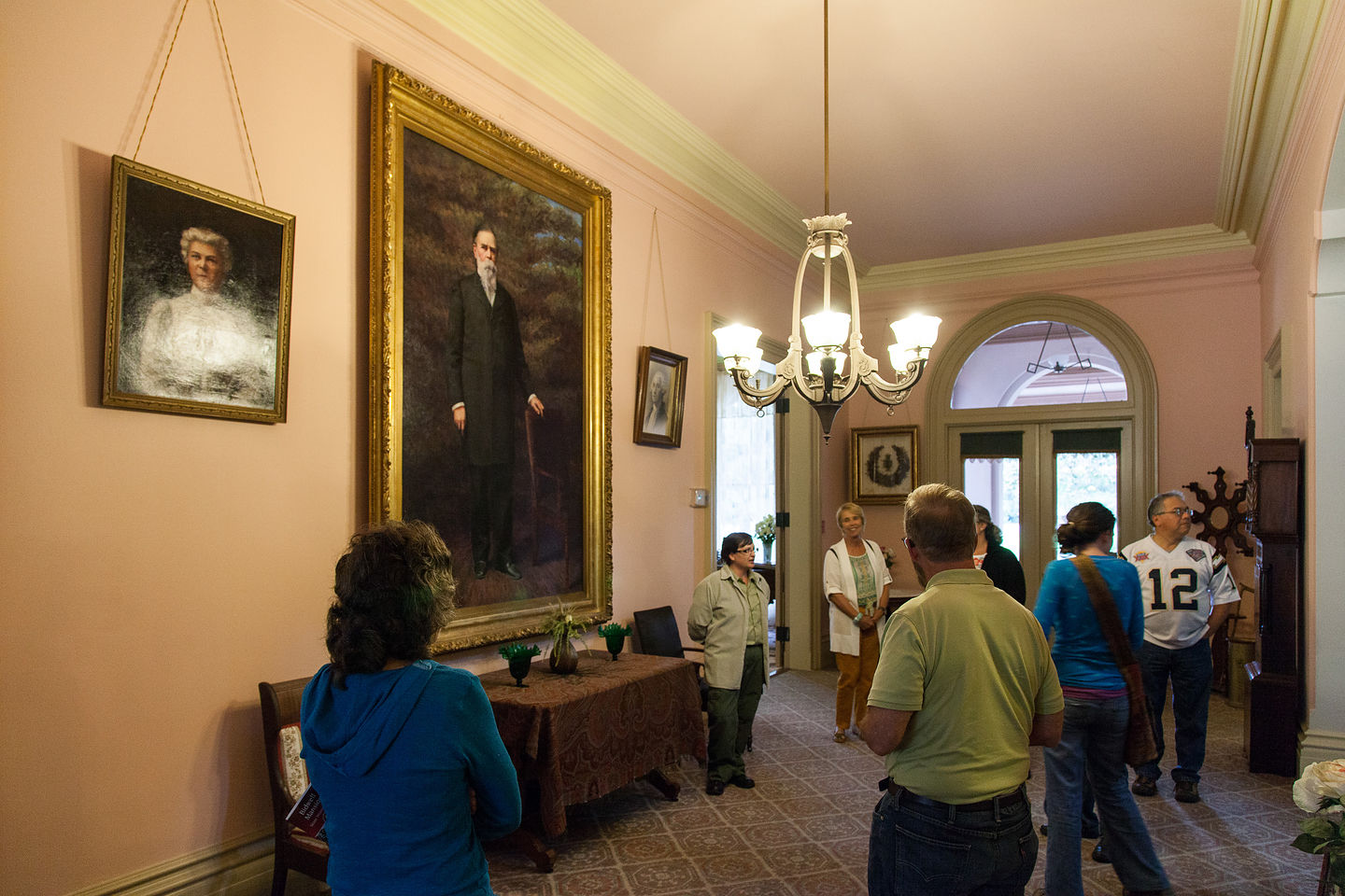 John and Annie Bidwell Portraits in Foyer with Tour Group