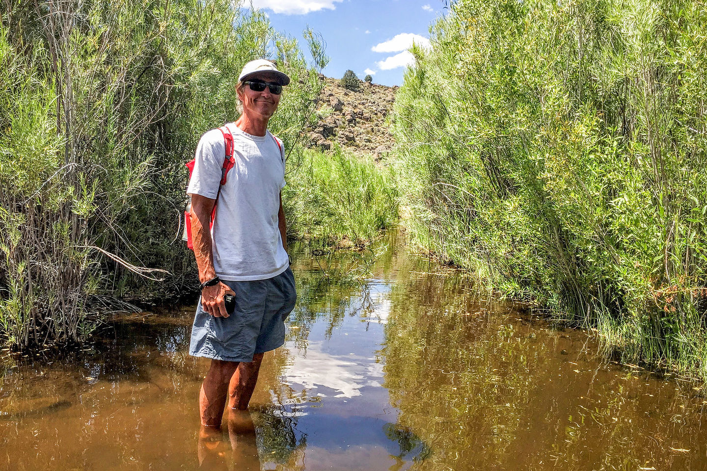 Herb fording the river to Dog Town