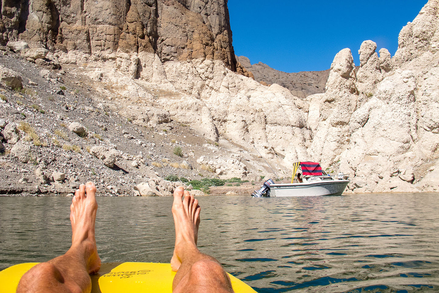 Picture of Herb's feet with cove in background