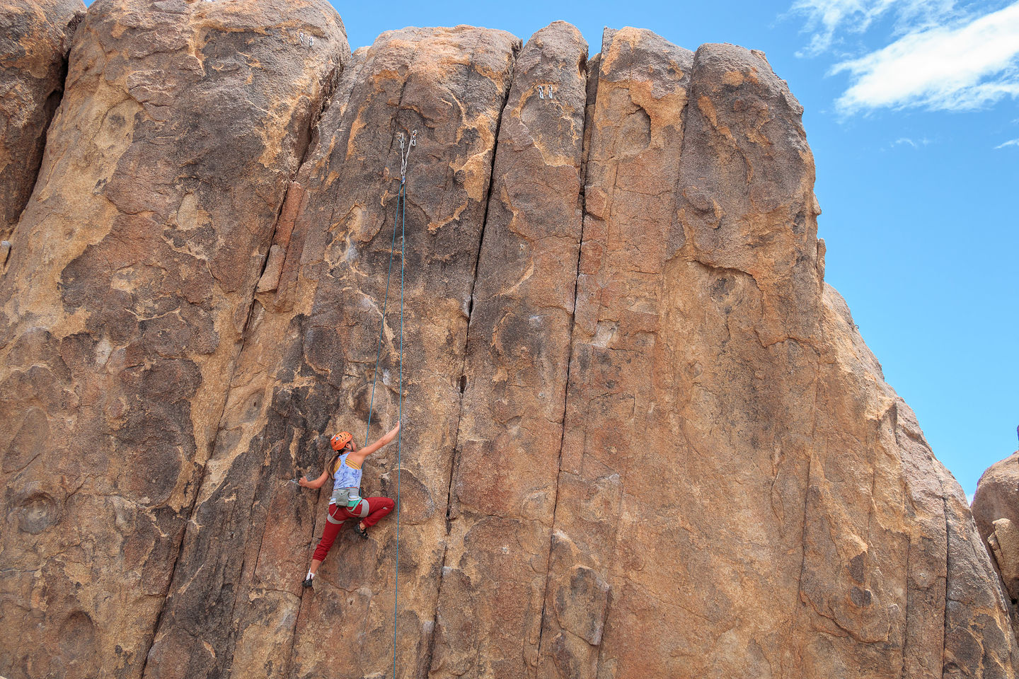 Celeste taking the "boot" off and climbing in the Alabama Hills