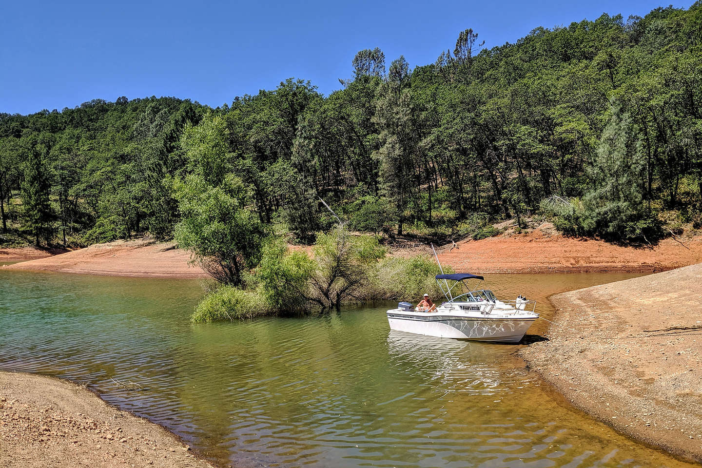 Captain Herb and his boat in our camping cove