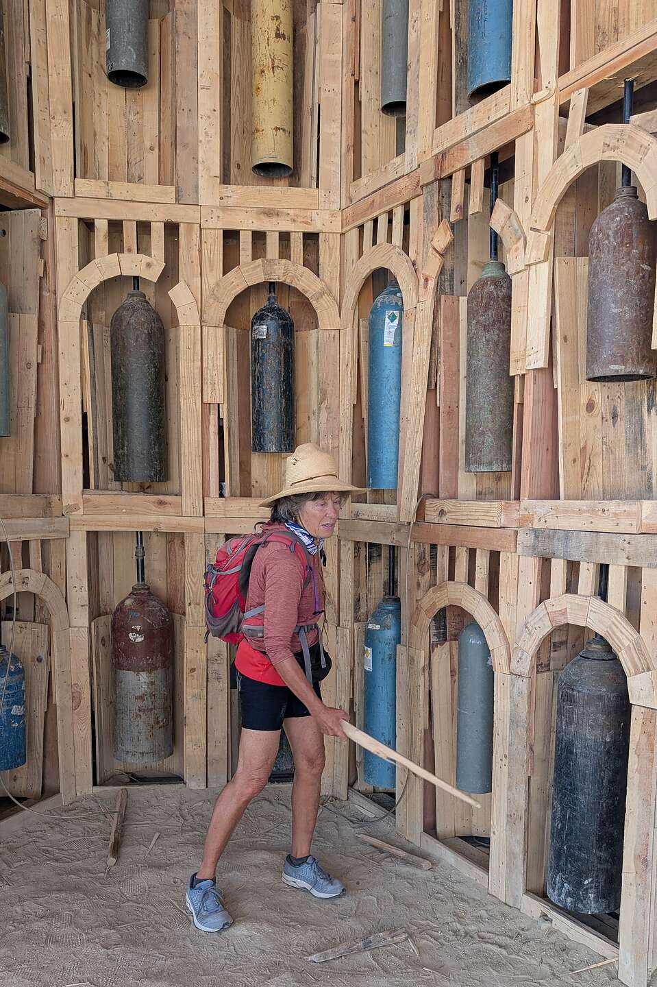 Striking the bells in the pavilion beneath The Man Striking the bells in the pavilion beneath The Man