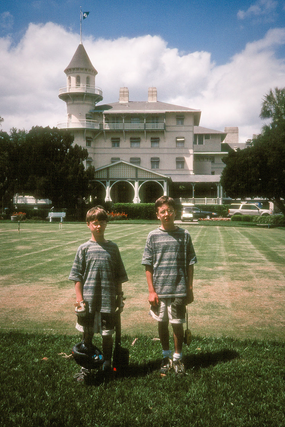 Boys in front of cottage