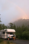 Rainbow over winnie with boys