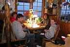 Kids playing cards in Miller's Landing lodge