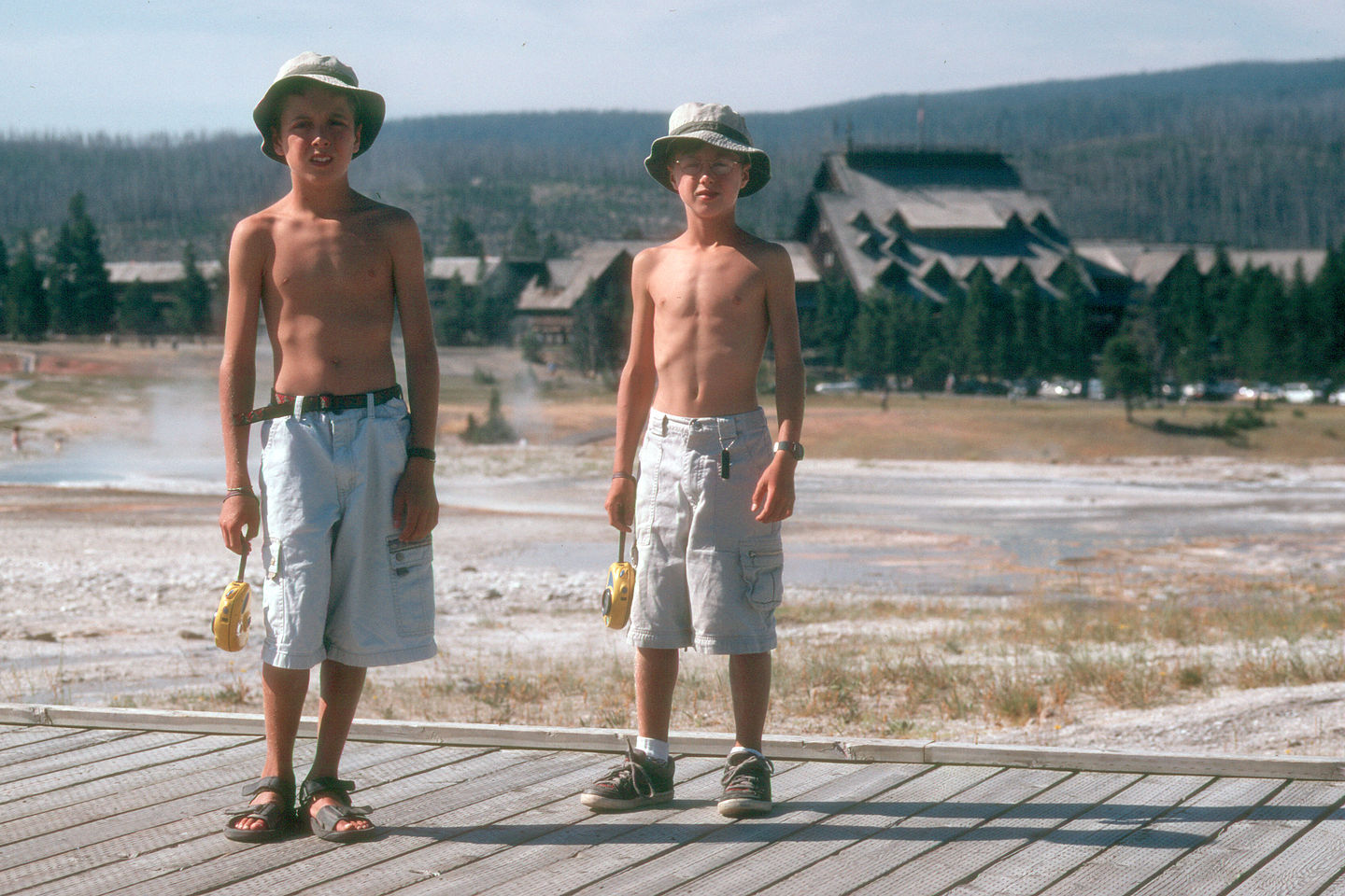 Boys on boardwalk by Old Faithful Inn