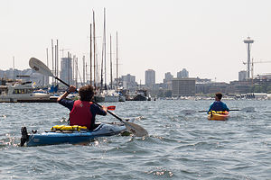 Boys Kayaking in Lake Union with Space Needle