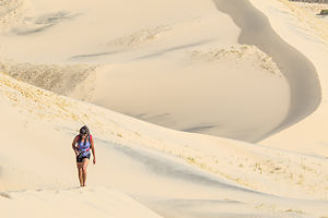 Lolo Hiking up Kelso Dune