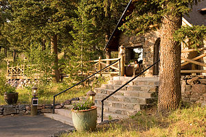 Lolo relaxing on Chief Hosa Lodge porch