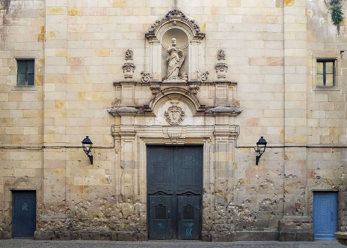 Shrapnel scars from the Spanish Civil War in the Placa Sant Felip Neri