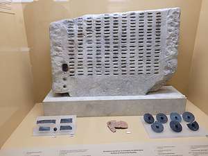 A kleroterion, ancient voting machine in the Agora Museum