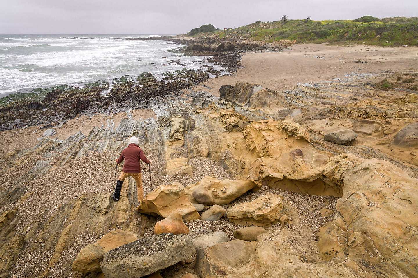 Determined to reach the tafoni on Pebble Beach