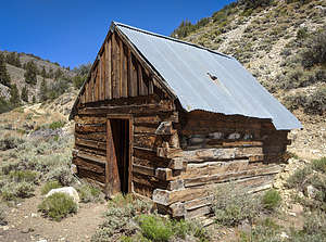 Old Miner&amp;#039;s cabin made of railroad ties along the Wyman Creek Road